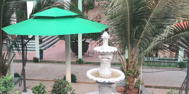Thay bạt dù che sân vườn